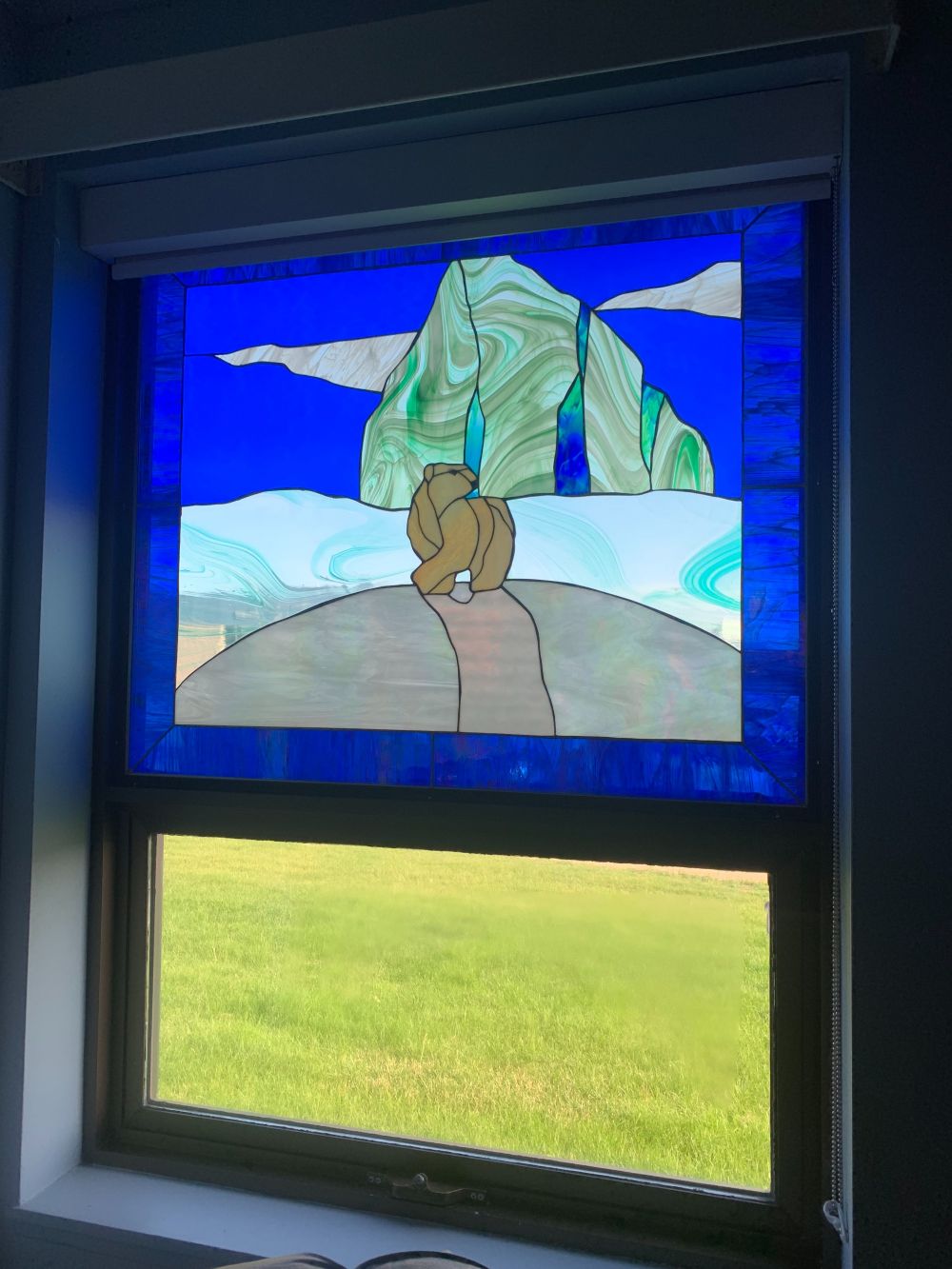 Stained glass window with bear and iceberg in Palliative Care Unit, Rocky Hospital